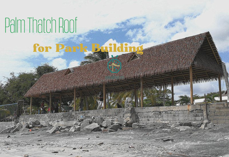 Faux plam thatch roof for waterfront outdoor park facilities